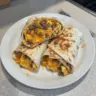 Delicious freezer breakfast burritos ready to eat for a quick morning meal
