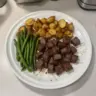 Garlic balsamic steak bites served on a platter