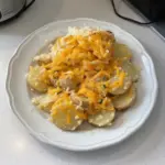 Delicious gluten-free cheesy potatoes baked to perfection