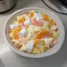 A vibrant Hawaiian fruit salad with tropical fruits like pineapple and mango