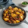 Hearty ground beef and potatoes dish served in a bowl, ideal for family meals