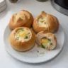 Freshly baked homemade bread bowls ready for serving soup or salad