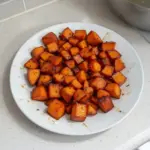 Delicious Honey Roasted Sweet Potatoes served in a dish