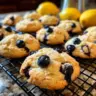 Freshly baked lemon blueberry cookies on a rustic wooden table