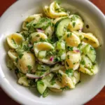 Refreshing light cucumber pasta salad served in a bowl