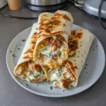 Low carb cheesy garlic chicken wraps with fresh vegetables and melted cheese