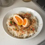 Delicious Mayak Eggs served in a bowl, garnished and ready to enjoy.