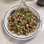 Colorful Mediterranean Bean Salad with fresh vegetables and herbs