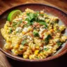Delicious Mexican street corn pasta salad with colorful ingredients.