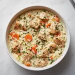 One-Pot gluten-free chicken and rice dish, garnished and ready to serve.