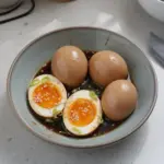 Delicious soy sauce eggs recipe served on a plate
