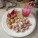 Sweet Prickly Pear Margarita Mocktail served in a glass with a slice of lime