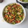 Colorful Tex Mex Salad with fresh vegetables and beans in a bowl