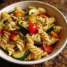 Delicious pasta salad with vibrant vegetables and Italian dressing