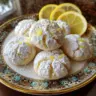 Freshly baked zesty lemon meltaway cookies on a cooling rack