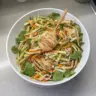 Delicious Asian noodle salad with fresh vegetables and dressing