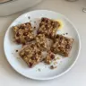 Delicious banana oatmeal bars on a wooden table, perfect for a healthy snack.