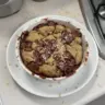 Delicious cookie baked oatmeal served in a bowl with chocolate chips.
