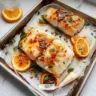 Easy sheet pan cod with citrus hoisin glaze served on a plate.