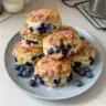 Flaky blueberry biscuits topped with a delicious lemon glaze.