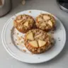 Fluffy baked apple cinnamon oatmeal cups served on a plate