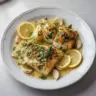 Plate of Gluten-Free Mediterranean Baked Cod with lemon and garlic seasoning