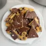 Delicious healthy cookie dough bark topped with chocolate and nuts