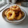 Delicious homemade pineapple fritters served on a plate