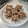 Irresistible cinnamon roll bliss bars ready to be enjoyed, showcasing gooey cinnamon and frosting.