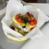 Mediterranean cod fillet in parchment with vegetables and herbs