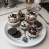 Delicious Oreo chocolate mousse cups topped with crushed Oreos