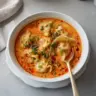 Delicious Thai Coconut Curry Soup with Dumplings in a bowl
