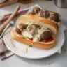 Delicious venison meatball subs with fresh toppings and sauce