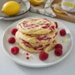 Delicious white chocolate lemon raspberry cookies on a plate