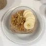 Bowl of brown sugar overnight oats topped with fruits and nuts