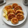 Homemade chicken patties cooked to golden perfection served on a plate
