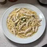 Delicious Chicken Tetrazzini served in a bowl with parsley garnish