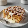 Delicious cinnamon roll waffles topped with cream cheese frosting