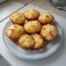 Delicious Coconut and Pineapple Cottage Cheese Muffins on a plate