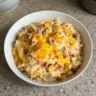 Cracked Out Chicken and Rice Bake dish featuring tender chicken and seasoned rice.