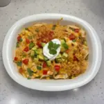 Creamy Mexican Rice and Chicken Dinner Casserole served in a baking dish