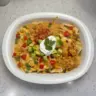 Creamy Mexican Rice and Chicken Dinner Casserole served in a baking dish