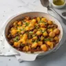 One-pan ground beef and potatoes dish prepared and served on a plate