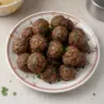 Delicious easy venison meatballs served on a plate with sauce