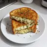 Delicious garlic bread grilled cheese sandwich melted cheese crispy exterior