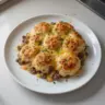 Savory ground beef and biscuit bake fresh out of the oven, perfect for dinner.