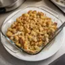 Hearty rotisserie chicken stuffing casserole baked to perfection