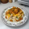 Delicious Million Dollar Chicken Casserole topped with cheese and breadcrumbs