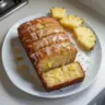 Delicious slice of pineapple bread on a wooden table