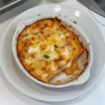 Protein-packed sweet potato egg casserole topped with fresh herbs